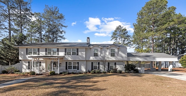 view of front of home featuring covered porch and a front lawn