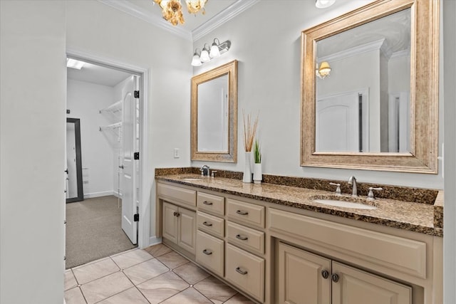 full bath with double vanity, tile patterned floors, ornamental molding, and a sink