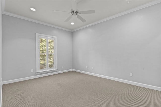 spare room featuring baseboards, recessed lighting, a ceiling fan, carpet floors, and ornamental molding