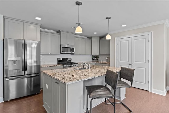 459 Paxton, Dothan, AL 36301 - kitchen with stainless steel appliances, gray cabinetry, crown molding, a sink, and light stone counters