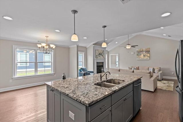 459 Paxton, Dothan, AL 36301 - kitchen with a sink, baseboards, appliances with stainless steel finishes, open floor plan, and gray cabinetry