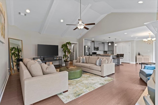 459 Paxton, Dothan, AL 36301 - living room featuring a chandelier, dark wood-type flooring, high vaulted ceiling, baseboards, and a ceiling fan