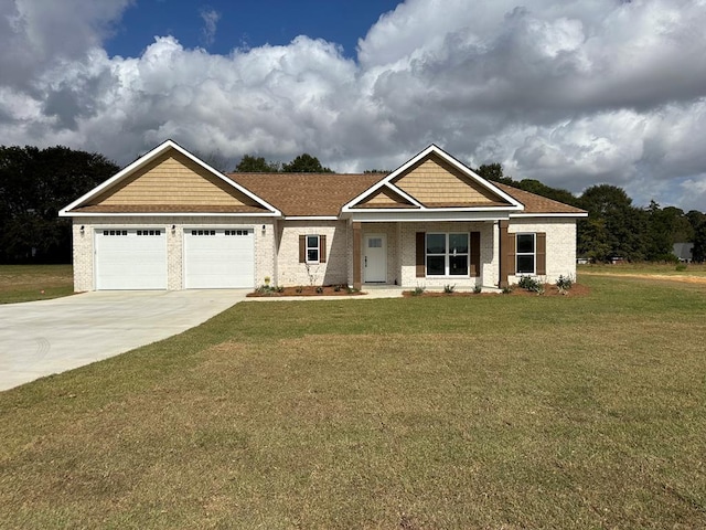 craftsman inspired home featuring a porch, a front yard, and a garage