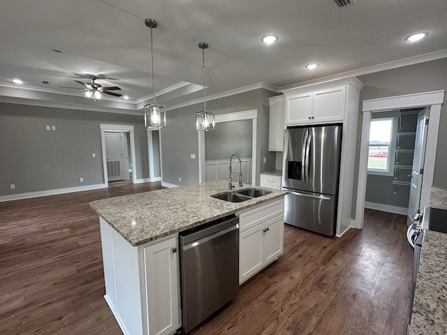 kitchen with dark hardwood / wood-style flooring, white cabinetry, sink, and stainless steel appliances