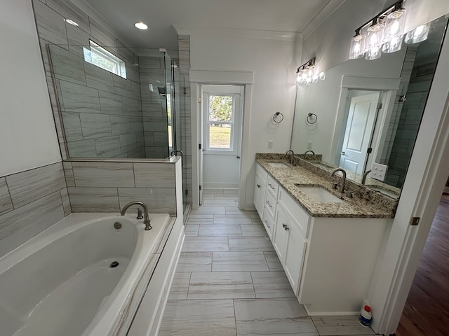 bathroom featuring vanity, crown molding, and plus walk in shower