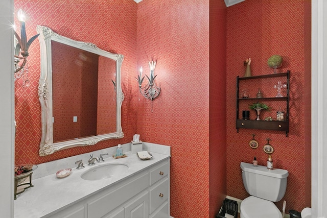 6 Williamsburg Pl, Dothan, AL 36305 - half bathroom featuring toilet, vanity, and wallpapered walls