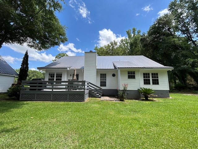 123 Waterford Way, Ashford, AL 36321 - rear view of house with a yard, a wooden deck, and metal roof