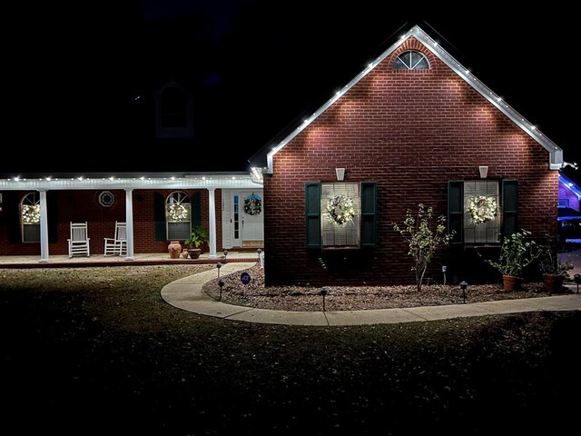 123 Waterford Way, Ashford, AL 36321 - view of front of home featuring brick siding and a porch