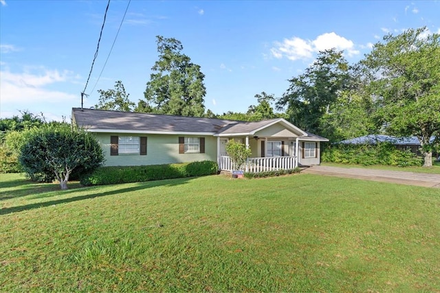 single story home with a porch and a front lawn