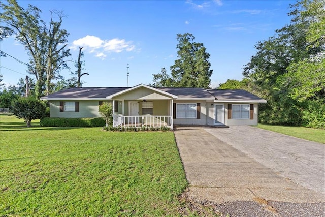 ranch-style home with a front yard and a porch