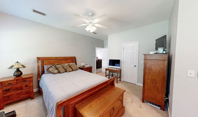218 Azalea Ln, Headland, AL 36345 - bedroom with light carpet, a ceiling fan, and baseboards