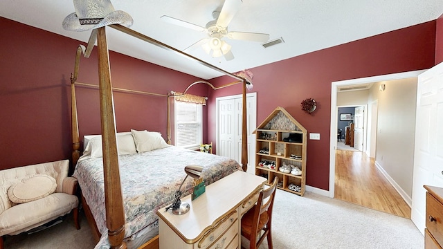 218 Azalea Ln, Headland, AL 36345 - carpeted bedroom featuring a closet, a ceiling fan, and baseboards