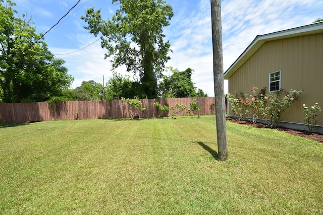 view of yard with fence