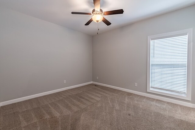 212 Archer Trl, Enterprise, AL 36330 - carpeted spare room with ceiling fan and baseboards