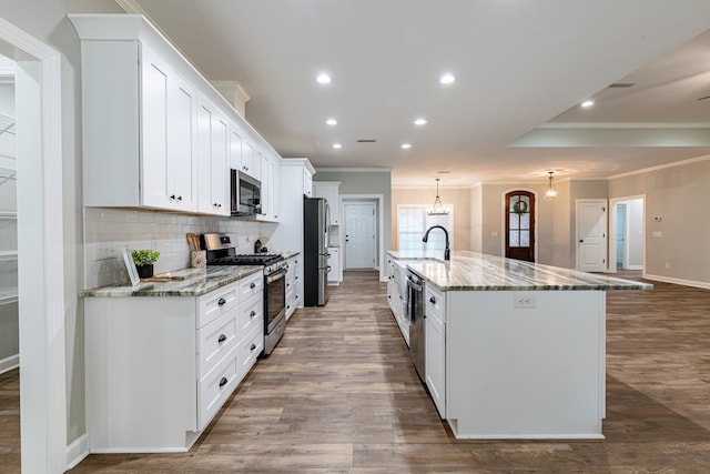 212 Archer Trl, Enterprise, AL 36330 - kitchen featuring white cabinets, stainless steel appliances, recessed lighting, backsplash, and crown molding