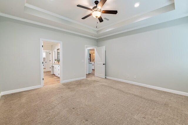212 Archer Trl, Enterprise, AL 36330 - unfurnished bedroom featuring light carpet, ornamental molding, and a raised ceiling