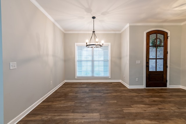 212 Archer Trl, Enterprise, AL 36330 - unfurnished dining area with an inviting chandelier, ornamental molding, dark wood-type flooring, arched walkways, and baseboards