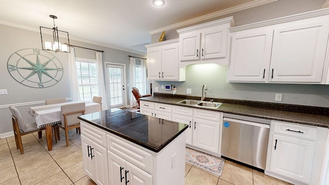 201 W Azalea Ln, Headland, AL 36345 - kitchen featuring stainless steel dishwasher, crown molding, light tile patterned floors, pendant lighting, and white cabinets