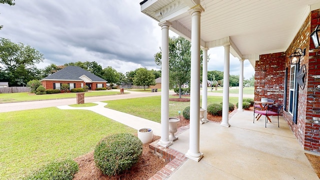 201 W Azalea Ln, Headland, AL 36345 - porch featuring a yard