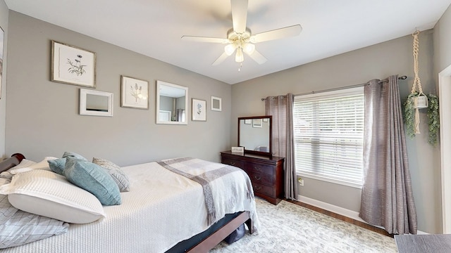 201 W Azalea Ln, Headland, AL 36345 - bedroom with light wood-type flooring and ceiling fan
