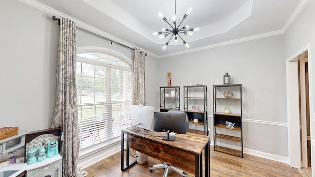 201 W Azalea Ln, Headland, AL 36345 - home office featuring a chandelier, light wood-type flooring, a raised ceiling, and ornamental molding