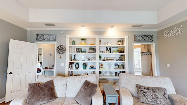201 W Azalea Ln, Headland, AL 36345 - living room featuring crown molding and a raised ceiling