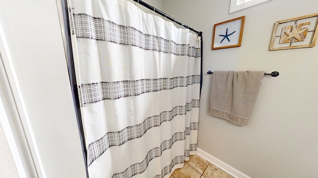 201 W Azalea Ln, Headland, AL 36345 - bathroom featuring tile patterned flooring and curtained shower