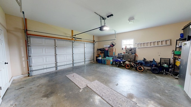 201 W Azalea Ln, Headland, AL 36345 - garage featuring a garage door opener