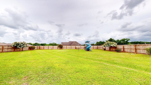 201 W Azalea Ln, Headland, AL 36345 - fenced backyard featuring a playground