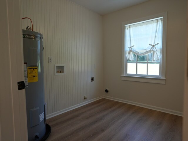 laundry room with hookup for an electric dryer, dark hardwood / wood-style flooring, electric water heater, and hookup for a washing machine