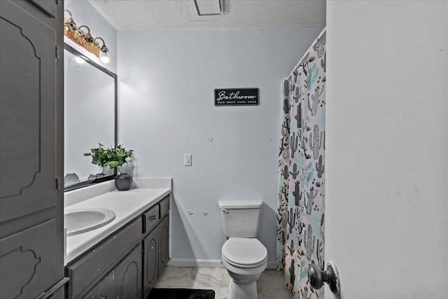 bathroom featuring baseboards, a shower with shower curtain, toilet, a textured ceiling, and vanity