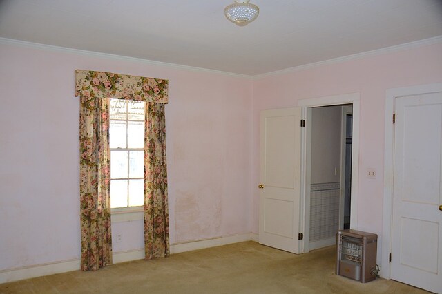 790 Claxton Ave, Elba, AL 36323 - carpeted empty room featuring crown molding and baseboards