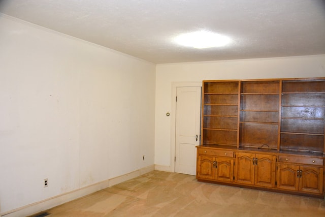 790 Claxton Ave, Elba, AL 36323 - unfurnished room with light carpet, baseboards, and ornamental molding