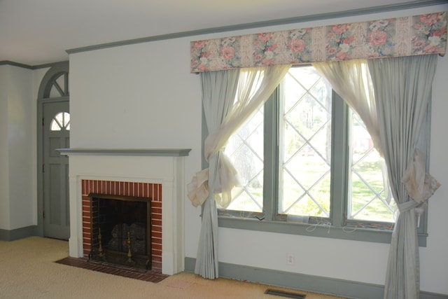790 Claxton Ave, Elba, AL 36323 - unfurnished living room with carpet floors, a brick fireplace, and visible vents