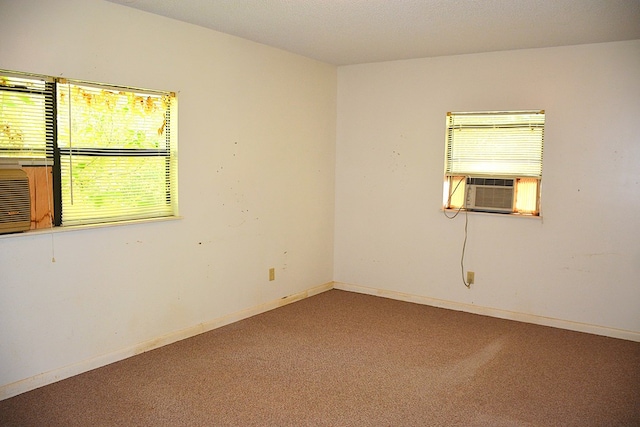 790 Claxton Ave, Elba, AL 36323 - empty room with baseboards, carpet flooring, and cooling unit