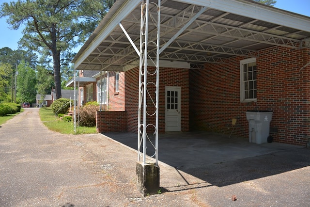 790 Claxton Ave, Elba, AL 36323 - view of property exterior featuring aphalt driveway and brick siding
