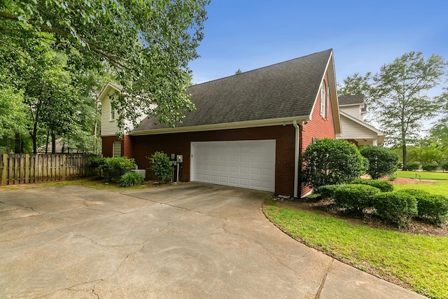 400 Bent Oak Dr, Dothan, AL 36303 - view of property exterior featuring brick siding, an attached garage, a shingled roof, and concrete driveway