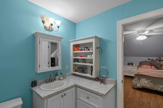 400 Bent Oak Dr, Dothan, AL 36303 - bathroom featuring vanity, wood finished floors, ceiling fan, and ensuite bath