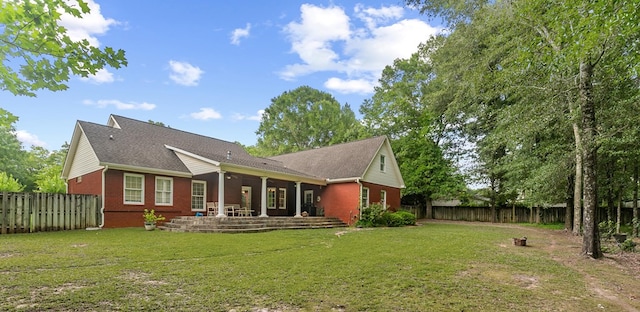 400 Bent Oak Dr, Dothan, AL 36303 - rear view of house featuring brick siding, a fenced backyard, roof with shingles, and a patio area