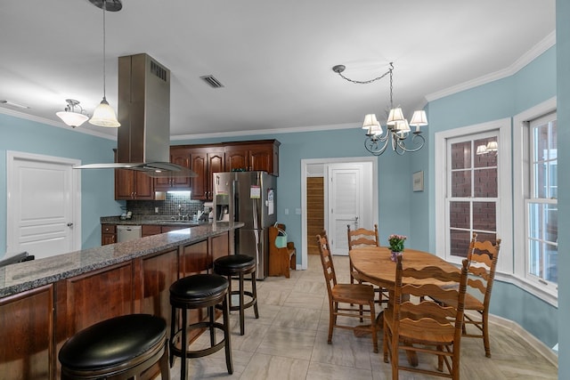 400 Bent Oak Dr, Dothan, AL 36303 - dining space featuring ornamental molding, a chandelier, and healthy amount of natural light