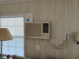 interior details featuring an AC wall unit