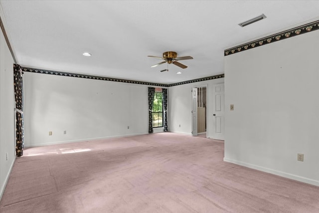 empty room featuring light carpet and ceiling fan