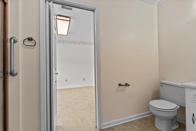 bathroom featuring tile patterned flooring and toilet