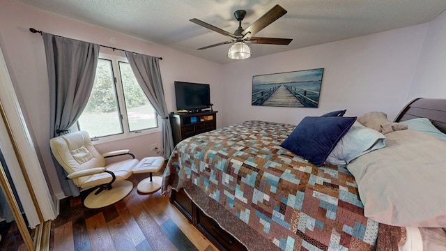 8875 E State Highway 52, Webb, AL 36376 - bedroom with wood finished floors and a ceiling fan