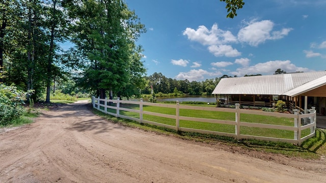 8875 E State Highway 52, Webb, AL 36376 - view of dirt / gravel road featuring an exterior structure and a water view