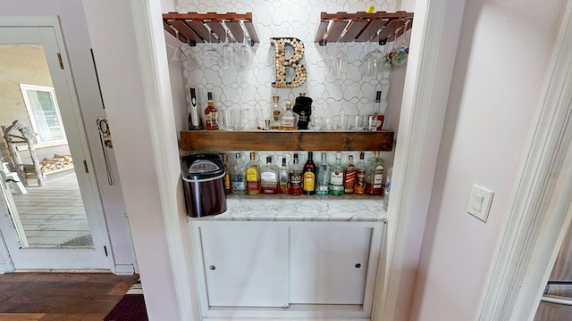 8875 E State Highway 52, Webb, AL 36376 - indoor dry bar with decorative backsplash and wood finished floors