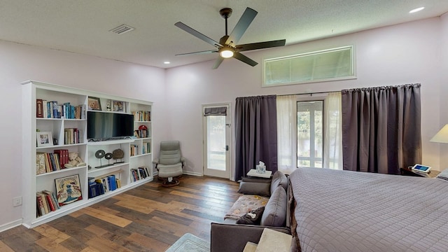 8875 E State Highway 52, Webb, AL 36376 - bedroom with wood finished floors, baseboards, ceiling fan, recessed lighting, and access to outside