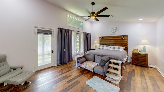 8875 E State Highway 52, Webb, AL 36376 - bedroom with access to exterior, wood-type flooring, recessed lighting, and ceiling fan