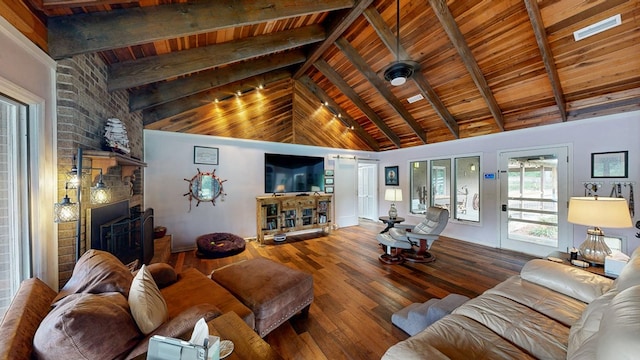 8875 E State Highway 52, Webb, AL 36376 - living area with wood finished floors, a fireplace, wooden ceiling with exposed beams, and high vaulted ceiling