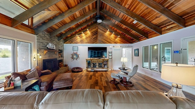 8875 E State Highway 52, Webb, AL 36376 - living area featuring a brick fireplace, wood-type flooring, wood ceiling with exposed beams, and high vaulted ceiling